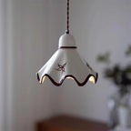 Pendant Lamp | Wavy Ceramic Shade & Metal Accents | 150 cm Adjustable Cord